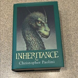 Scholastic Inheritance Hardcover Book - Teal Green Cover